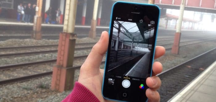 Rail tracks at a local train station, viewed on a mobile phone