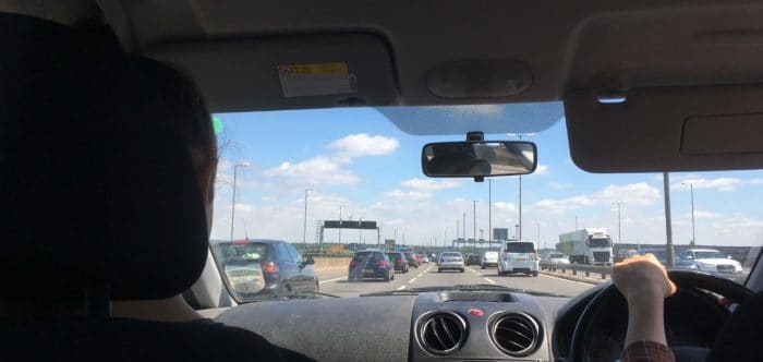 A car passenger's view of heavy traffic on a dual carriageway
