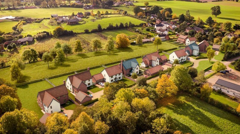 Rural housing in green fields