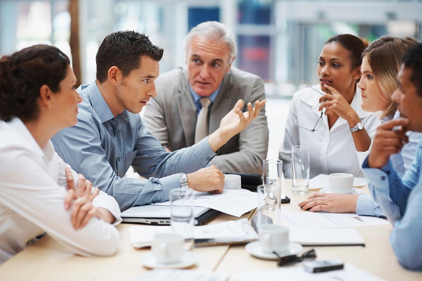 A group of people in a meeting