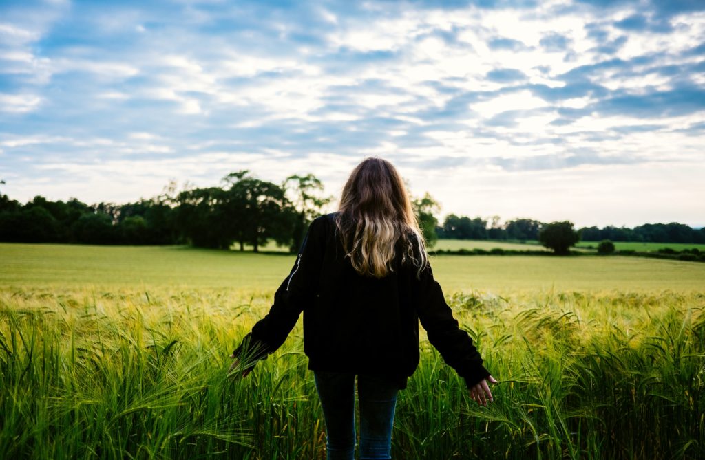 Teenager in a field of crops