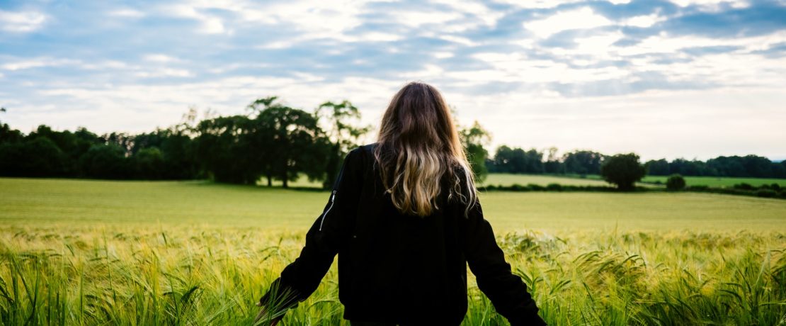 Teenager in a field of crops