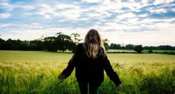 Teenager in a field of crops