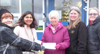 CPRE Norfolk trustees Sandra Walmsley and Pallavi Devulapalli present a cheque for £2000 to Marham Village Pre-school.