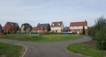 A new housing estate built on a greenfield site.