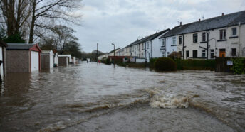 Flooded houses on a road in Bingley, West Yorkshire