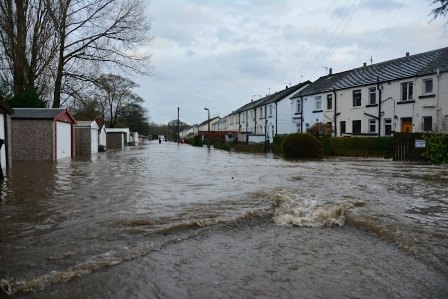 Flooded houses on a road in Bingley, West Yorkshire