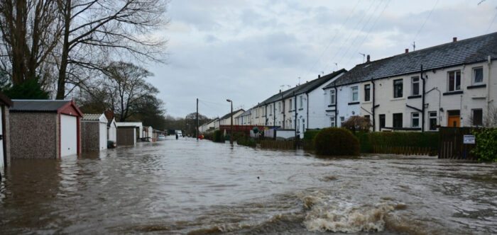 Flooded houses on a road in Bingley, West Yorkshire
