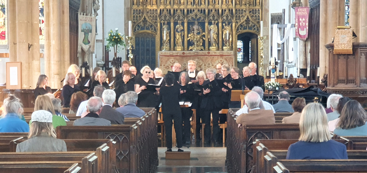 The Sine Nomine choir singing at the CPRE Norfolk charity concert inside St Peter Mancroft, Norwich.