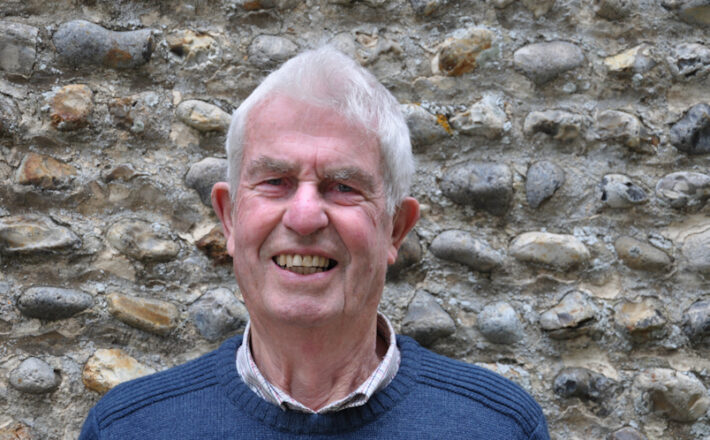 A head and shoulders photo of a smiling Dr Ian Shepherd