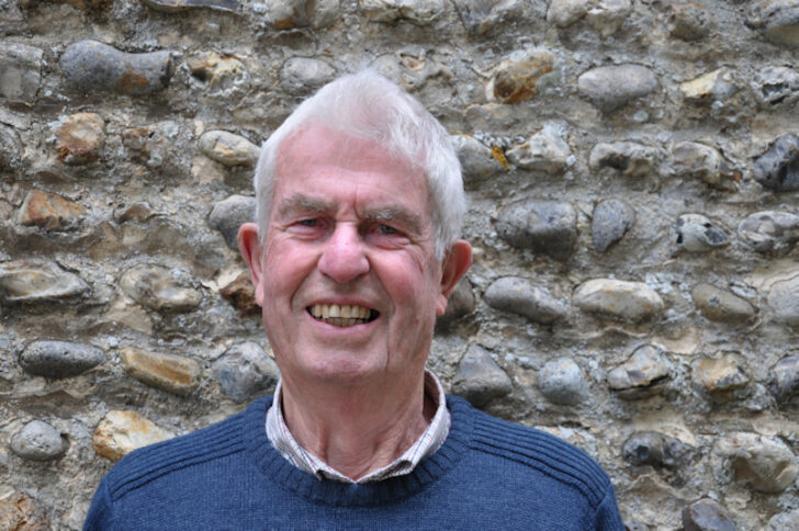 A head and shoulders photo of a smiling Dr Ian Shepherd
