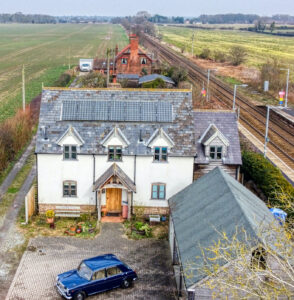 An aerial view of a eco-friendly, new-build house.