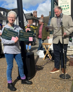 Tessa Greaves receiving their Countryside Champion Award certificates from former CPRE Norfolk President Tim O'Riordan