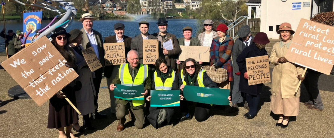 Agricultural workers from 1926 celebrating a centenary of protecting the countryside with CPRE Norfolk staff and supporters.