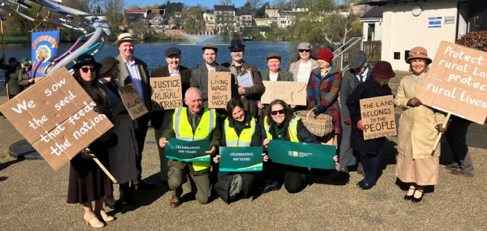 Agricultural workers from 1926 celebrating a centenary of protecting the countryside with CPRE Norfolk staff and supporters.